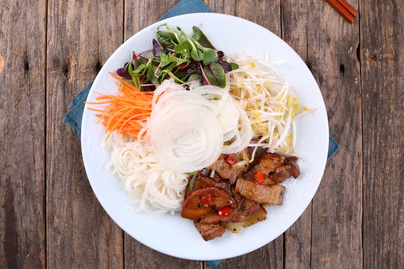 Sweet pork salad in tostada shell